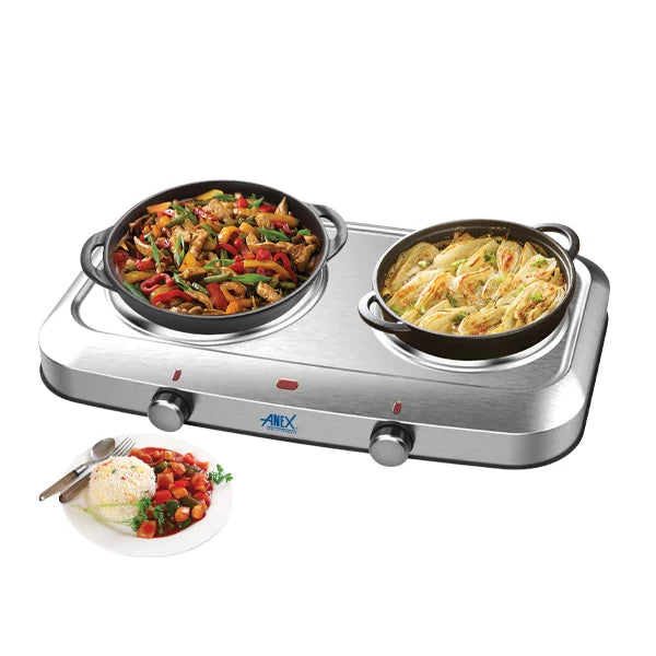 Anex AG-2164 double hot plate with two pots cooking food, and a plate of prepared food