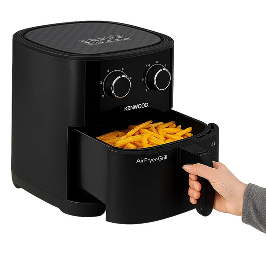 Kenwood air fryer with basket pulled out holding fries
